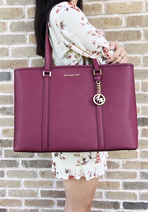 michael kors laptop clutch